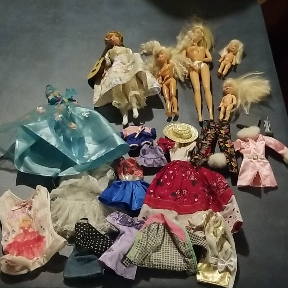 Lot of Barbies and Clothes *older-1990's
